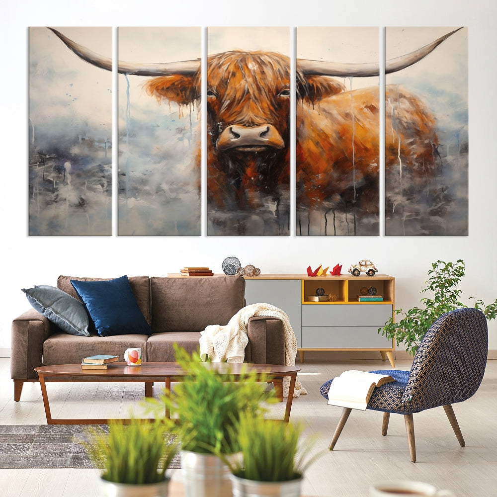 The stunning Scottish Highland Cow Canvas Wall Art enhances the room with its rustic decor. Its three-panel design features a longhorn animal theme, creating a striking presence on the dark wall.