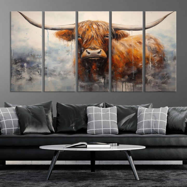 The stunning Scottish Highland Cow Canvas Wall Art enhances the room with its rustic decor. Its three-panel design features a longhorn animal theme, creating a striking presence on the dark wall.