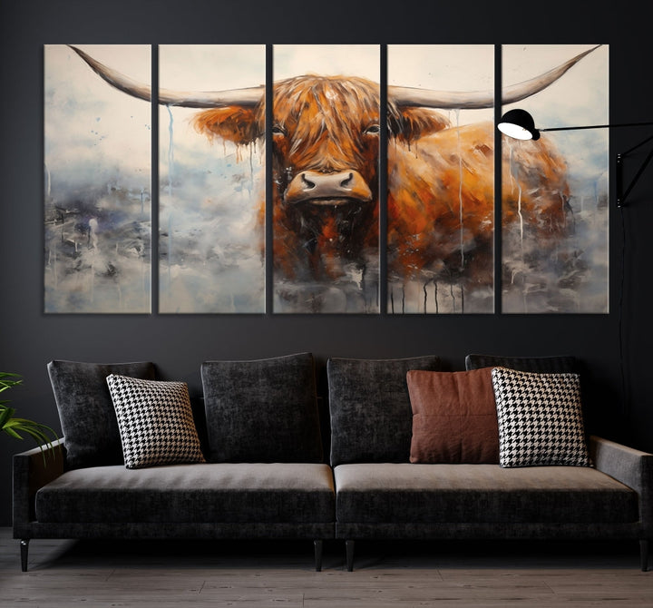 The stunning Scottish Highland Cow Canvas Wall Art enhances the room with its rustic decor. Its three-panel design features a longhorn animal theme, creating a striking presence on the dark wall.