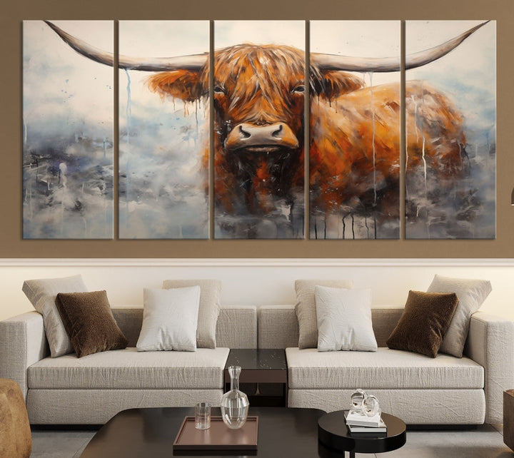 The stunning Scottish Highland Cow Canvas Wall Art enhances the room with its rustic decor. Its three-panel design features a longhorn animal theme, creating a striking presence on the dark wall.