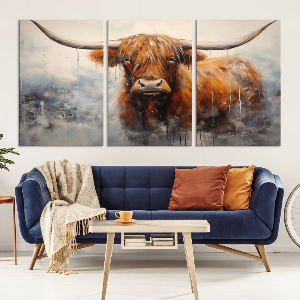 The stunning Scottish Highland Cow Canvas Wall Art enhances the room with its rustic decor. Its three-panel design features a longhorn animal theme, creating a striking presence on the dark wall.