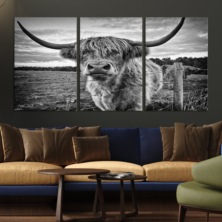 The "Scottish Highland Cow Canvas Wall Art Farmhouse Decor" adds a touch of rustic charm to your living room wall above the couch.