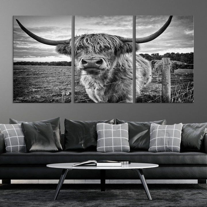 The "Scottish Highland Cow Canvas Wall Art Farmhouse Decor" adds a touch of rustic charm to your living room wall above the couch.