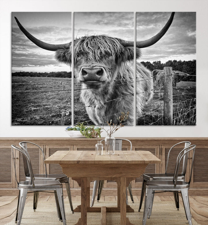 The "Scottish Highland Cow Canvas Wall Art Farmhouse Decor" adds a touch of rustic charm to your living room wall above the couch.