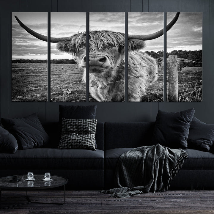 The "Scottish Highland Cow Canvas Wall Art Farmhouse Decor" adds a touch of rustic charm to your living room wall above the couch.