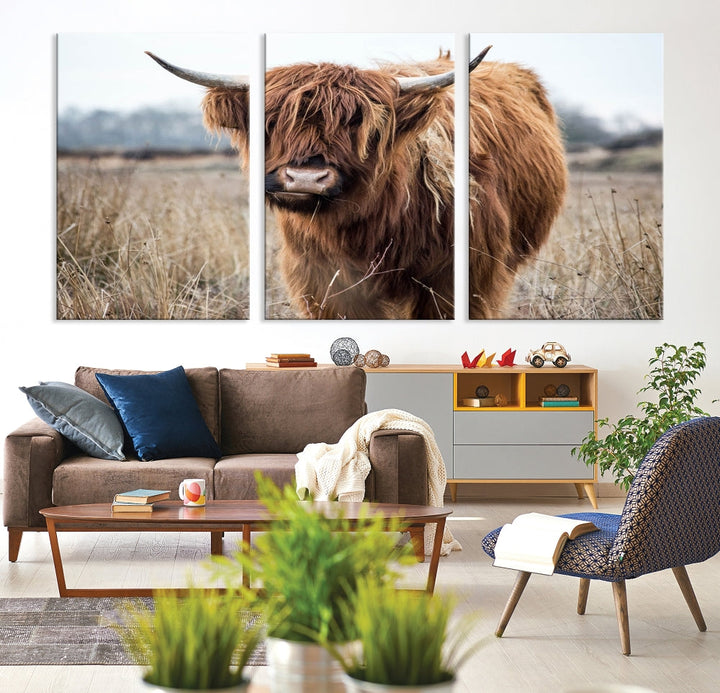 The modern farmhouse aesthetic comes to life with the Scottish Highland Cow Canvas Wall Art, featuring rustic charm and a breathtaking depiction of highland cattle in a natural setting.