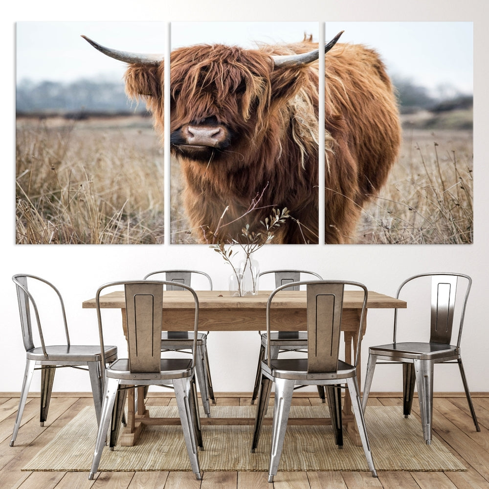 The modern farmhouse aesthetic comes to life with the Scottish Highland Cow Canvas Wall Art, featuring rustic charm and a breathtaking depiction of highland cattle in a natural setting.