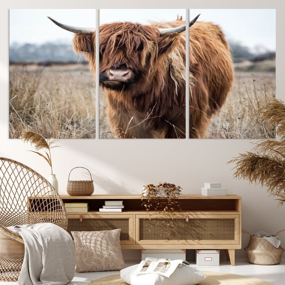 The modern farmhouse aesthetic comes to life with the Scottish Highland Cow Canvas Wall Art, featuring rustic charm and a breathtaking depiction of highland cattle in a natural setting.