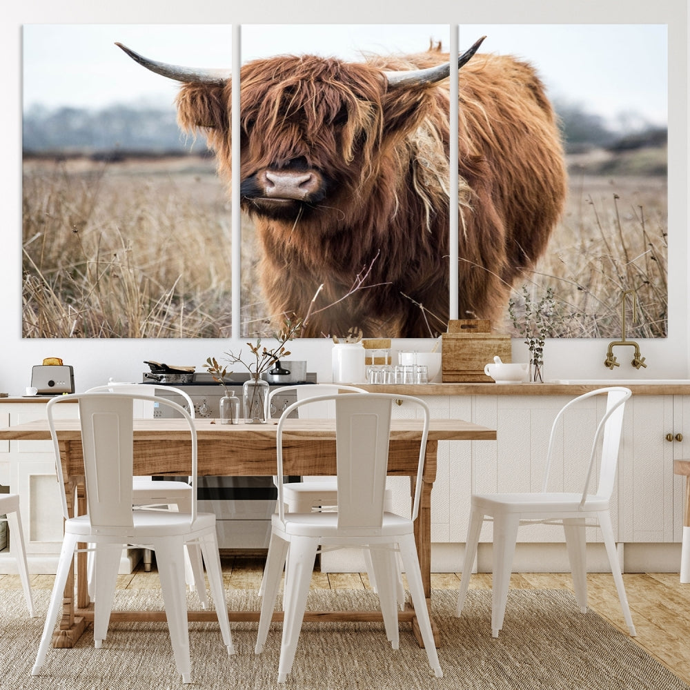 The modern farmhouse aesthetic comes to life with the Scottish Highland Cow Canvas Wall Art, featuring rustic charm and a breathtaking depiction of highland cattle in a natural setting.