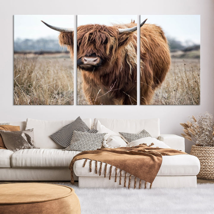 The modern farmhouse aesthetic comes to life with the Scottish Highland Cow Canvas Wall Art, featuring rustic charm and a breathtaking depiction of highland cattle in a natural setting.