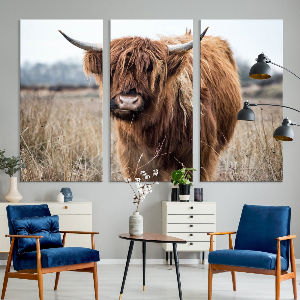 The modern farmhouse aesthetic comes to life with the Scottish Highland Cow Canvas Wall Art, featuring rustic charm and a breathtaking depiction of highland cattle in a natural setting.