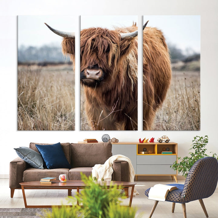 The modern farmhouse aesthetic comes to life with the Scottish Highland Cow Canvas Wall Art, featuring rustic charm and a breathtaking depiction of highland cattle in a natural setting.