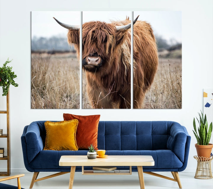 The modern farmhouse aesthetic comes to life with the Scottish Highland Cow Canvas Wall Art, featuring rustic charm and a breathtaking depiction of highland cattle in a natural setting.