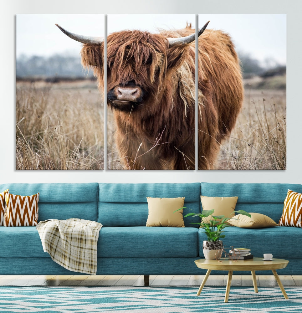 The modern farmhouse aesthetic comes to life with the Scottish Highland Cow Canvas Wall Art, featuring rustic charm and a breathtaking depiction of highland cattle in a natural setting.