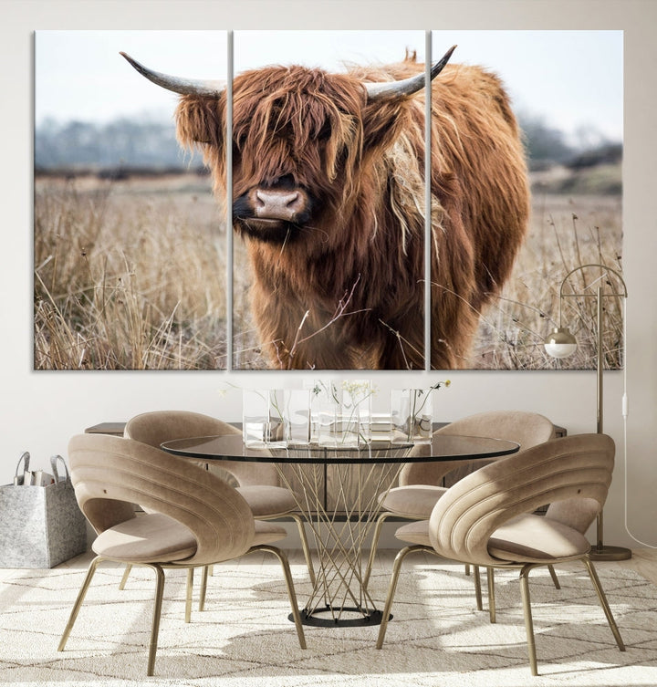 The modern farmhouse aesthetic comes to life with the Scottish Highland Cow Canvas Wall Art, featuring rustic charm and a breathtaking depiction of highland cattle in a natural setting.