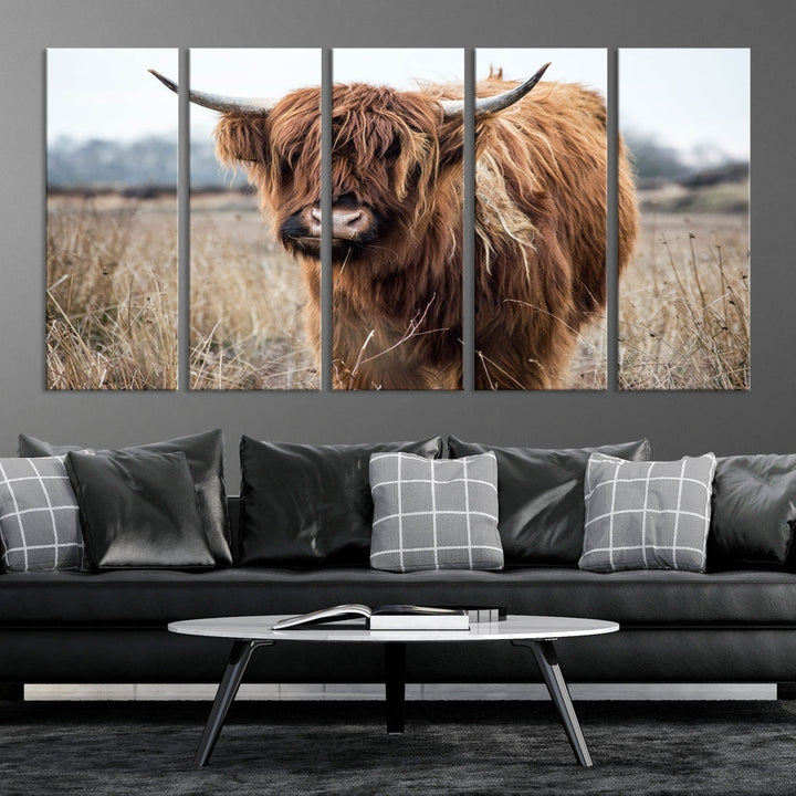 The modern farmhouse aesthetic comes to life with the Scottish Highland Cow Canvas Wall Art, featuring rustic charm and a breathtaking depiction of highland cattle in a natural setting.