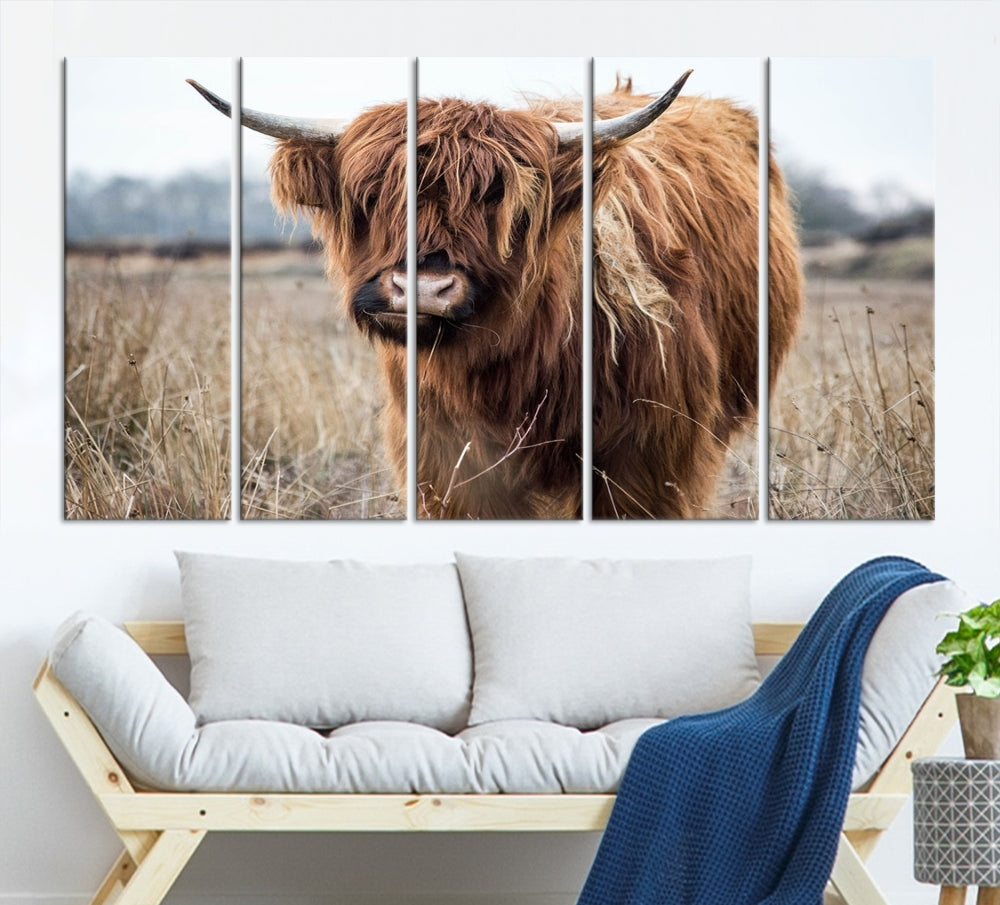 The modern farmhouse aesthetic comes to life with the Scottish Highland Cow Canvas Wall Art, featuring rustic charm and a breathtaking depiction of highland cattle in a natural setting.