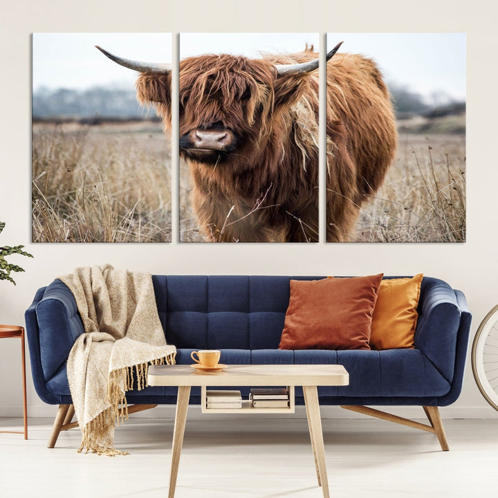 The modern farmhouse aesthetic comes to life with the Scottish Highland Cow Canvas Wall Art, featuring rustic charm and a breathtaking depiction of highland cattle in a natural setting.