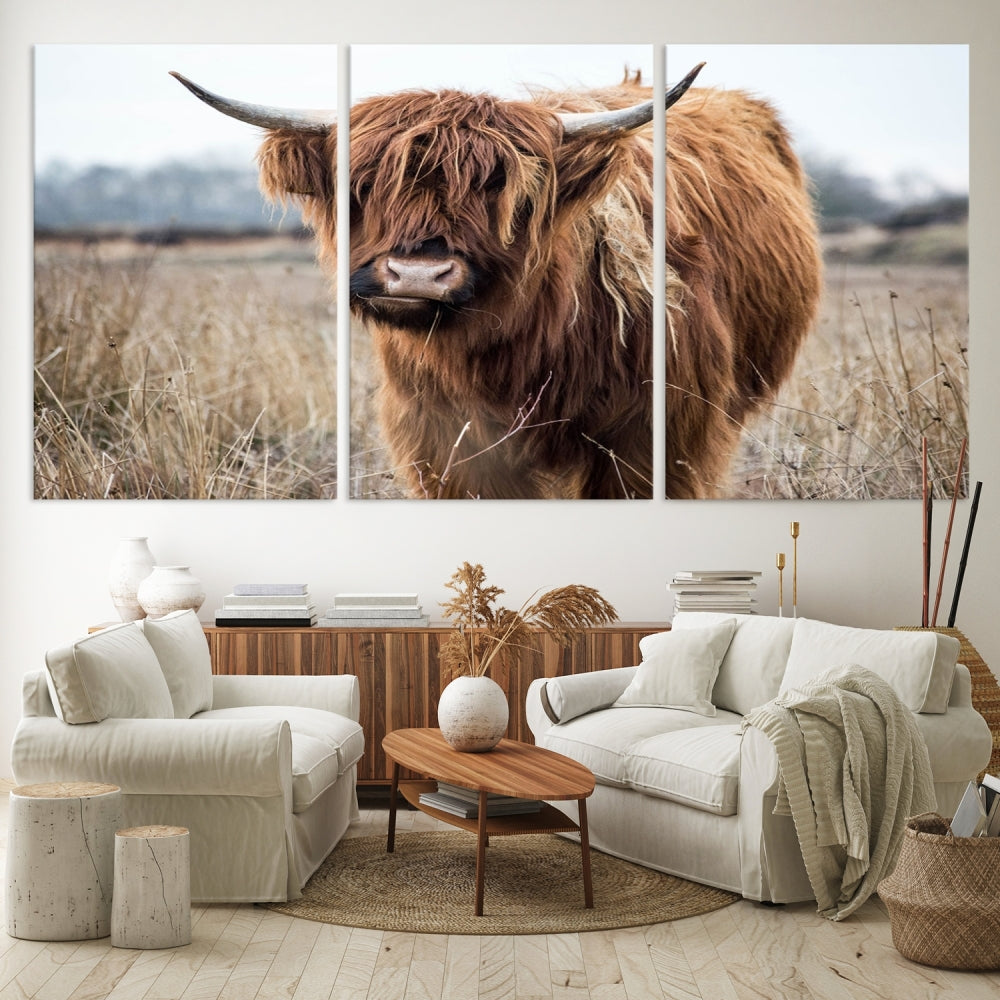 The modern farmhouse aesthetic comes to life with the Scottish Highland Cow Canvas Wall Art, featuring rustic charm and a breathtaking depiction of highland cattle in a natural setting.