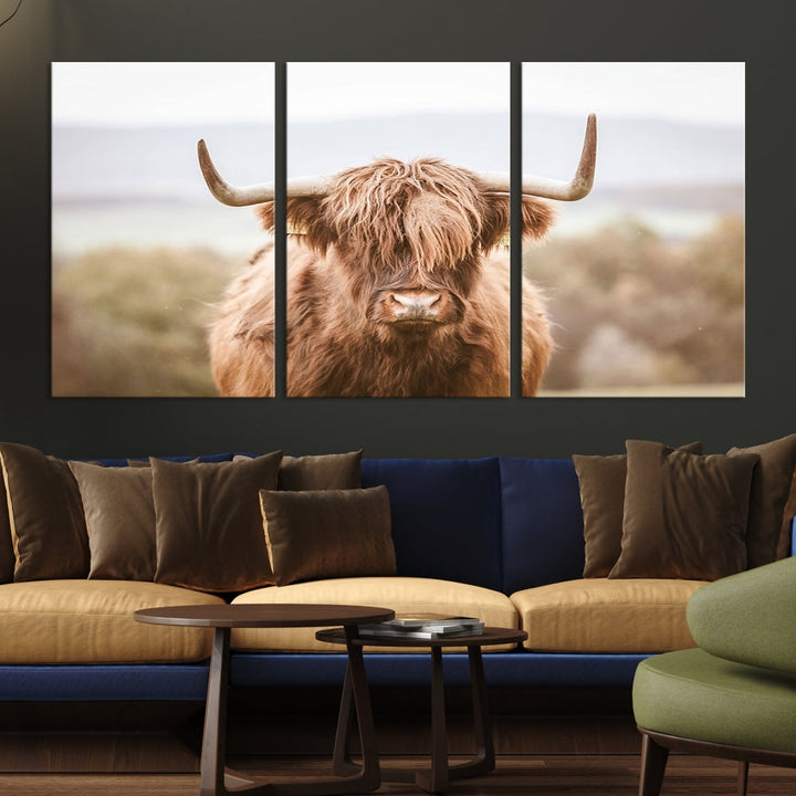 Canvas wall art featuring a Highland cow with long, shaggy fur in natural pastel tones, ready to hang.