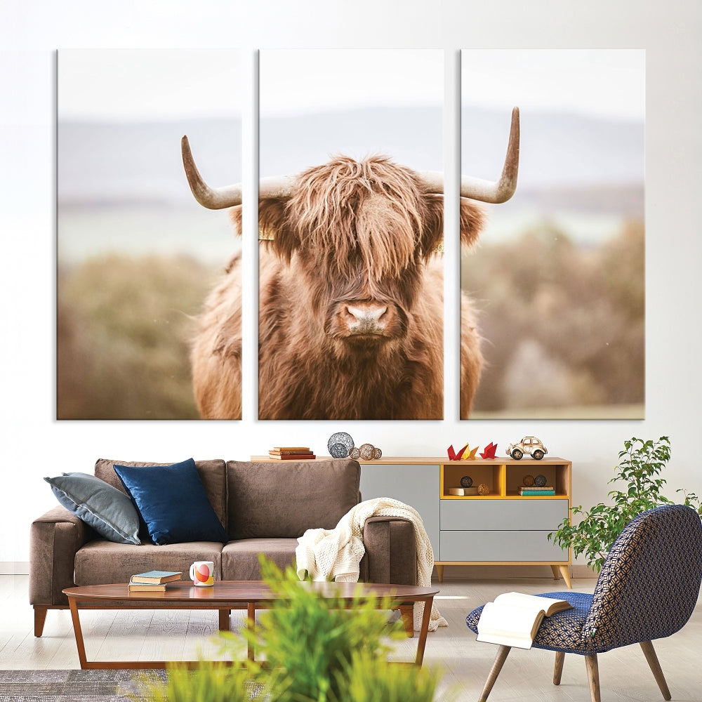 Canvas wall art featuring a Highland cow with long, shaggy fur in natural pastel tones, ready to hang.