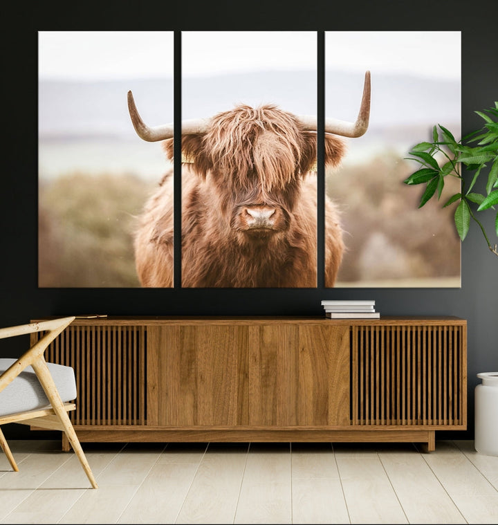 Canvas wall art featuring a Highland cow with long, shaggy fur in natural pastel tones, ready to hang.