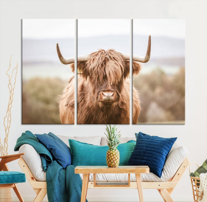 Canvas wall art featuring a Highland cow with long, shaggy fur in natural pastel tones, ready to hang.