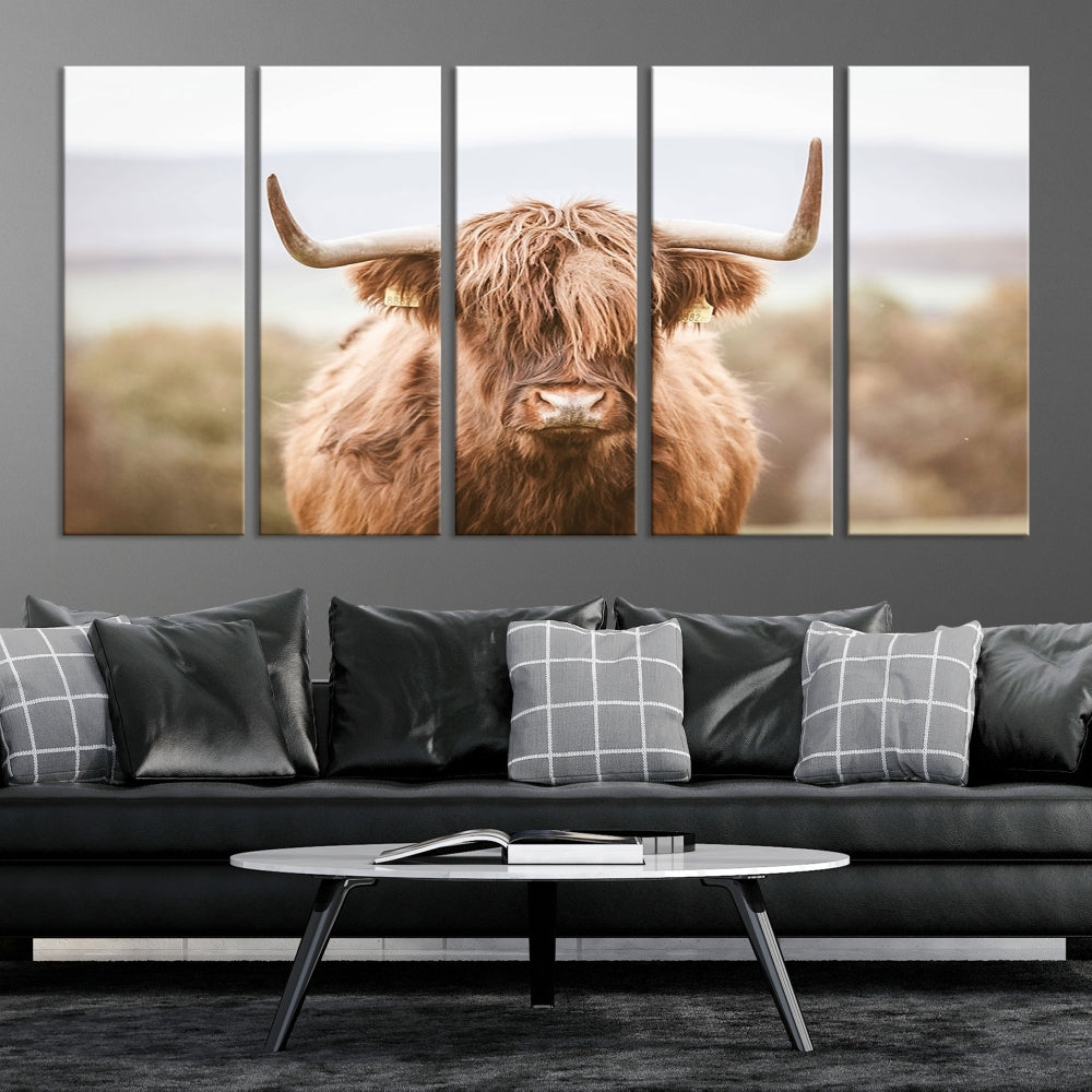 Canvas wall art featuring a Highland cow with long, shaggy fur in natural pastel tones, ready to hang.