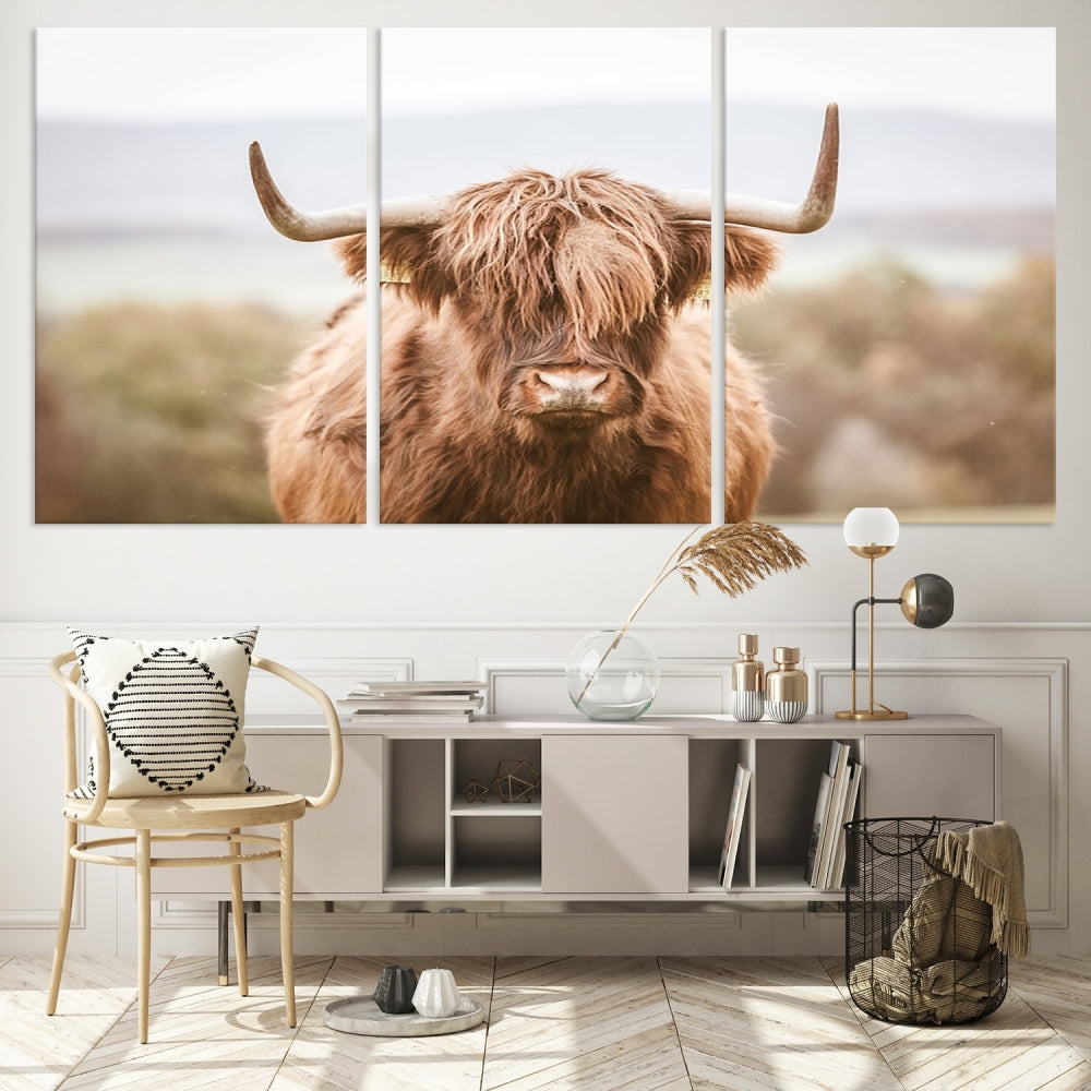 Canvas wall art featuring a Highland cow with long, shaggy fur in natural pastel tones, ready to hang.