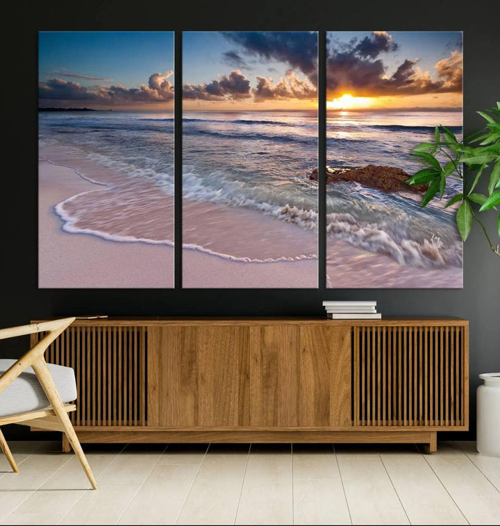 The modern living room is highlighted by a Sea Ocean Sunset Beach Wall Art Canvas Print on the wall, adding a serene coastal touch to the space.