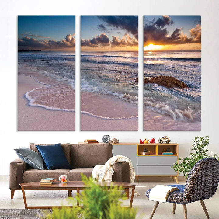 The modern living room is highlighted by a Sea Ocean Sunset Beach Wall Art Canvas Print on the wall, adding a serene coastal touch to the space.