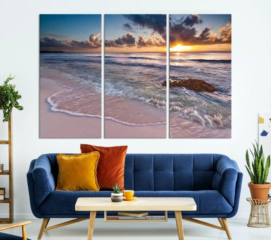 The modern living room is highlighted by a Sea Ocean Sunset Beach Wall Art Canvas Print on the wall, adding a serene coastal touch to the space.