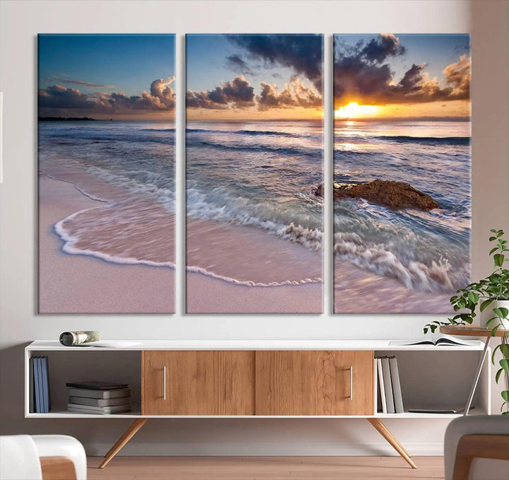 The modern living room is highlighted by a Sea Ocean Sunset Beach Wall Art Canvas Print on the wall, adding a serene coastal touch to the space.