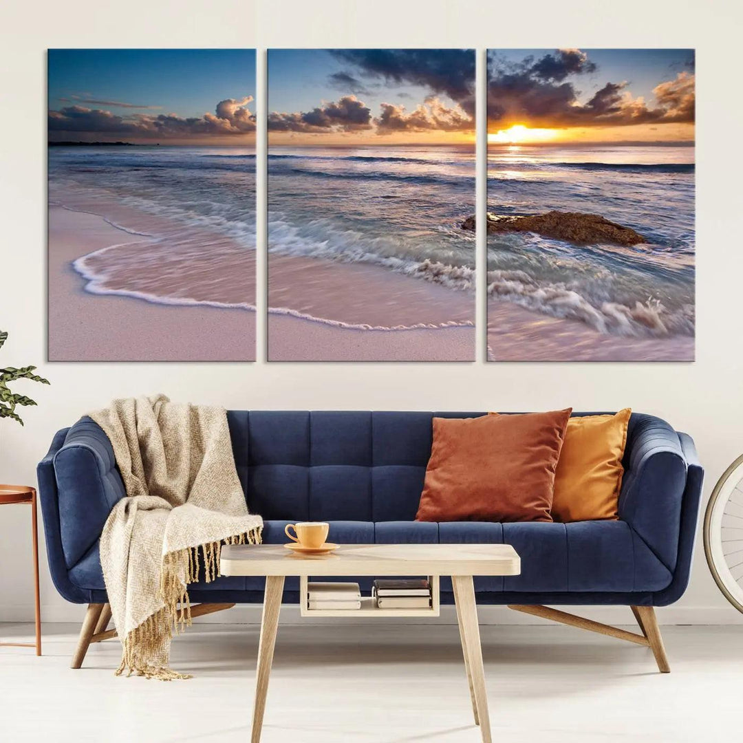 The modern living room is highlighted by a Sea Ocean Sunset Beach Wall Art Canvas Print on the wall, adding a serene coastal touch to the space.