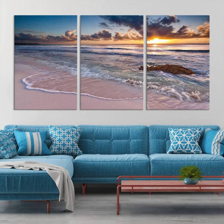 The modern living room is highlighted by a Sea Ocean Sunset Beach Wall Art Canvas Print on the wall, adding a serene coastal touch to the space.