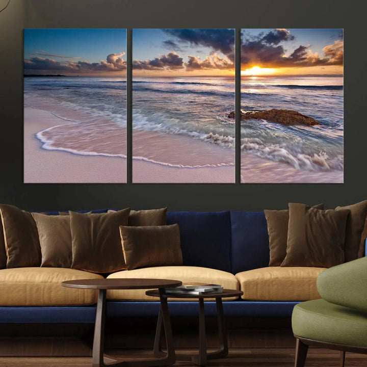 The modern living room is highlighted by a Sea Ocean Sunset Beach Wall Art Canvas Print on the wall, adding a serene coastal touch to the space.