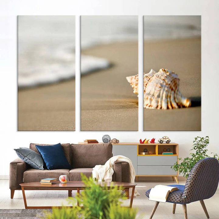 The triptych artwork titled "Sea Shell on the Beach Canvas Wall Art Beach Canvas Print" showcases a seashell on a sandy beach with ocean waves in the background, creating a stunning piece of coastal wall decor.