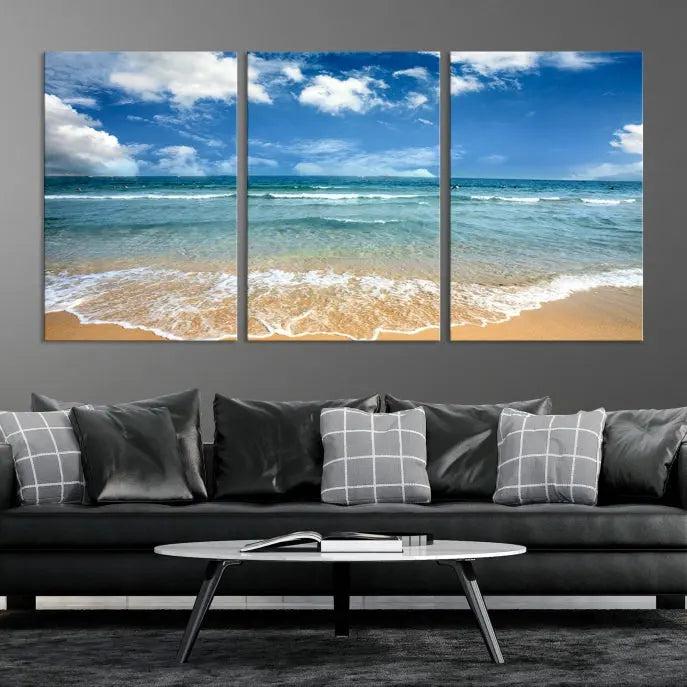 The "Sea View From the Beach Canvas Print" triptych adorns the wall. Each piece is printed on museum-quality canvas, ready to hang, and designed to preserve its vibrant colors with a UV-protective coating.