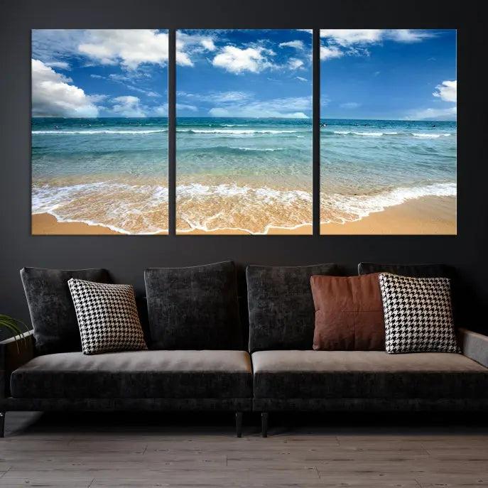 The "Sea View From the Beach Canvas Print" triptych adorns the wall. Each piece is printed on museum-quality canvas, ready to hang, and designed to preserve its vibrant colors with a UV-protective coating.