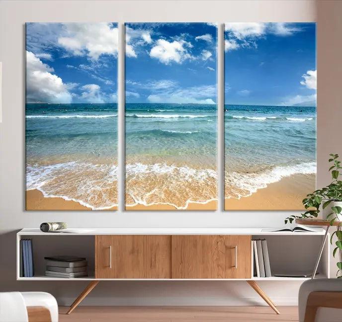 The "Sea View From the Beach Canvas Print" triptych adorns the wall. Each piece is printed on museum-quality canvas, ready to hang, and designed to preserve its vibrant colors with a UV-protective coating.