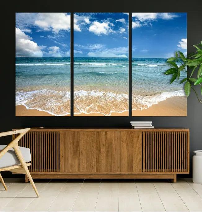 The "Sea View From the Beach Canvas Print" triptych adorns the wall. Each piece is printed on museum-quality canvas, ready to hang, and designed to preserve its vibrant colors with a UV-protective coating.