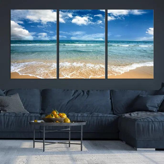 The "Sea View From the Beach Canvas Print" triptych adorns the wall. Each piece is printed on museum-quality canvas, ready to hang, and designed to preserve its vibrant colors with a UV-protective coating.