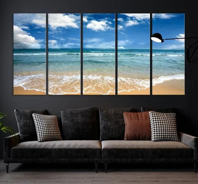 The "Sea View From the Beach Canvas Print" triptych adorns the wall. Each piece is printed on museum-quality canvas, ready to hang, and designed to preserve its vibrant colors with a UV-protective coating.