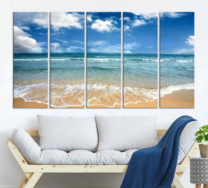 The "Sea View From the Beach Canvas Print" triptych adorns the wall. Each piece is printed on museum-quality canvas, ready to hang, and designed to preserve its vibrant colors with a UV-protective coating.