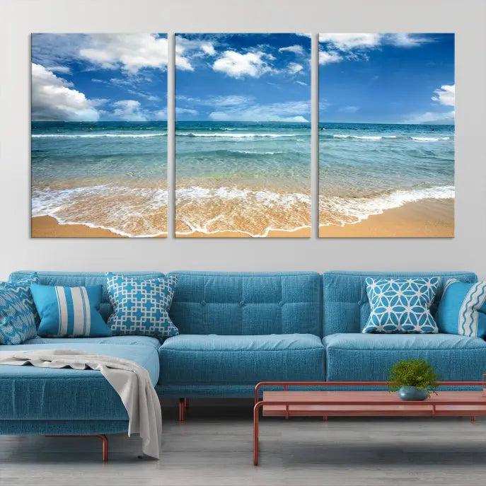 The "Sea View From the Beach Canvas Print" triptych adorns the wall. Each piece is printed on museum-quality canvas, ready to hang, and designed to preserve its vibrant colors with a UV-protective coating.