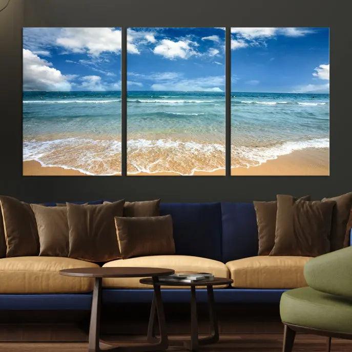 The "Sea View From the Beach Canvas Print" triptych adorns the wall. Each piece is printed on museum-quality canvas, ready to hang, and designed to preserve its vibrant colors with a UV-protective coating.