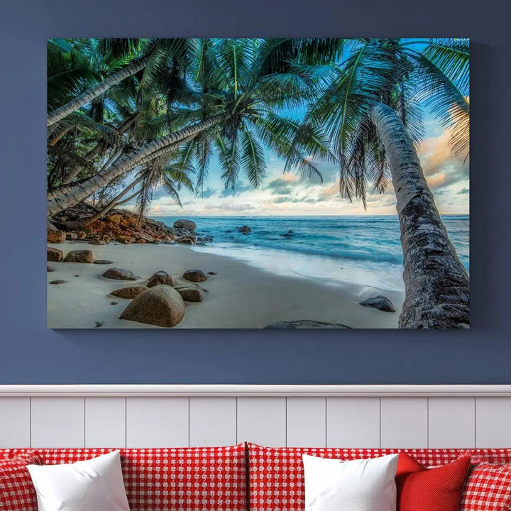 The Serene Tropical Beach Palm Trees Wall Art Canvas Print—a Coastal Paradise 3-Panel Artwork featuring ocean waves—enhances the space with its Giclee technology print.