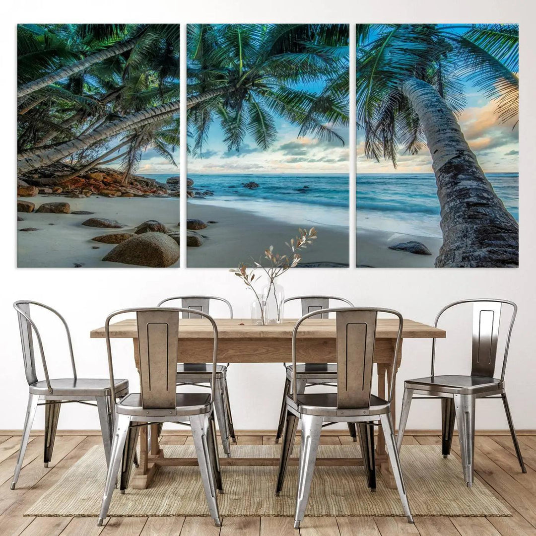 The Serene Tropical Beach Palm Trees Wall Art Canvas Print—a Coastal Paradise 3-Panel Artwork featuring ocean waves—enhances the space with its Giclee technology print.