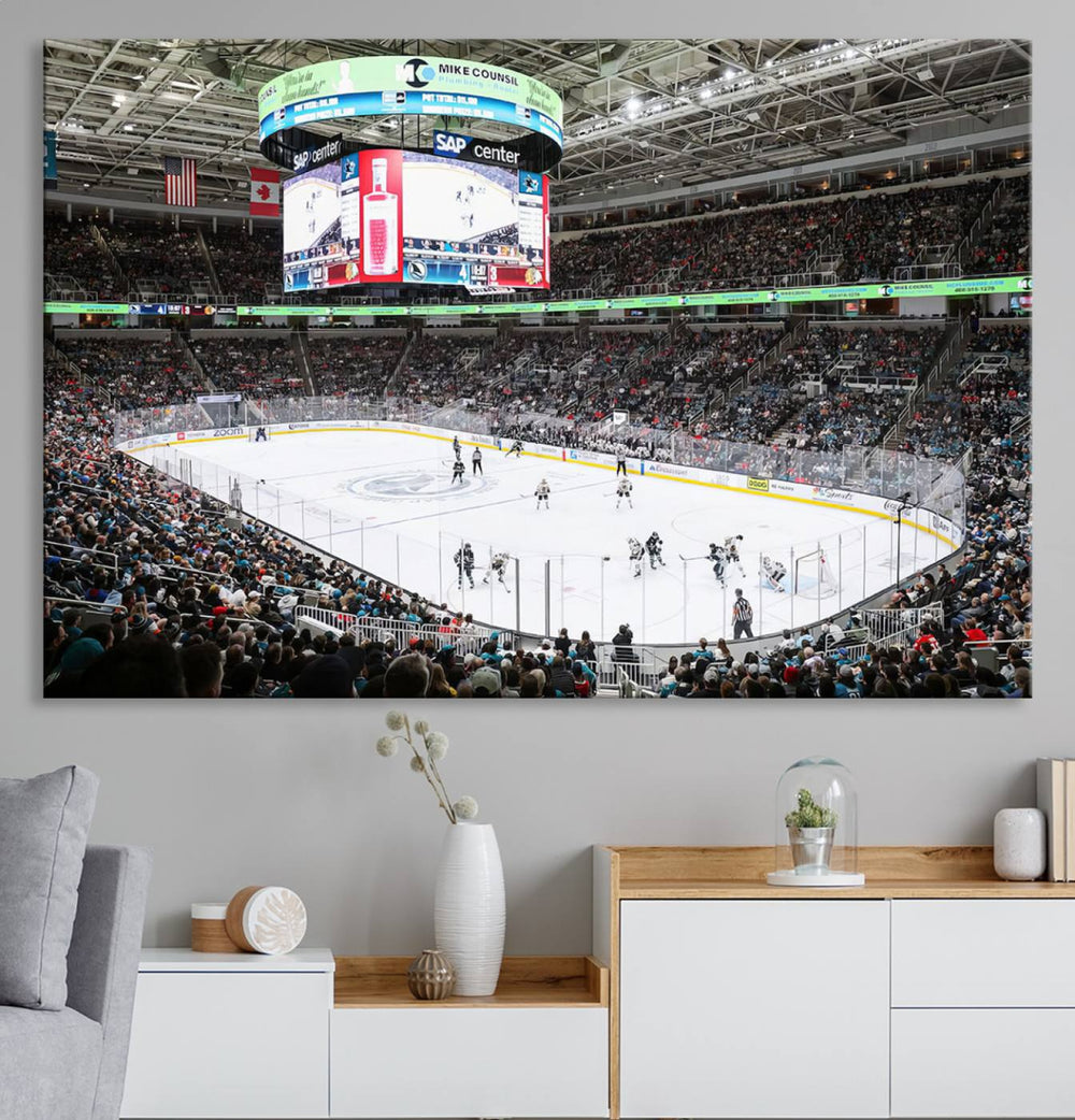 A packed ice hockey arena buzzes with energy as players glide on the ice and a large screen displays scores. The indoor decor features Sharks Arena Blackhawks Sharks Ice Hockey Stadium Wall Art Canvas Prints, creating an unexpected yet charming sporting atmosphere reminiscent of a gallery.