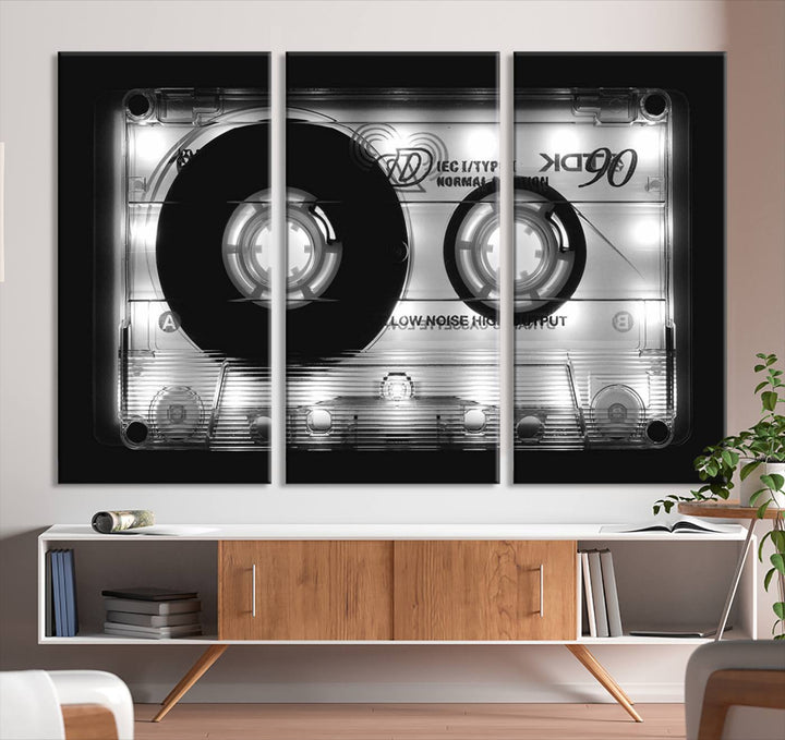 The Shining Audio Cassette Retro Music Wall Art Canvas Print, featuring museum-quality canvases with a UV-protective coating, is elegantly displayed. Enjoy free shipping on this stylish centerpiece.